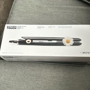 Natural touch brand new flat iron